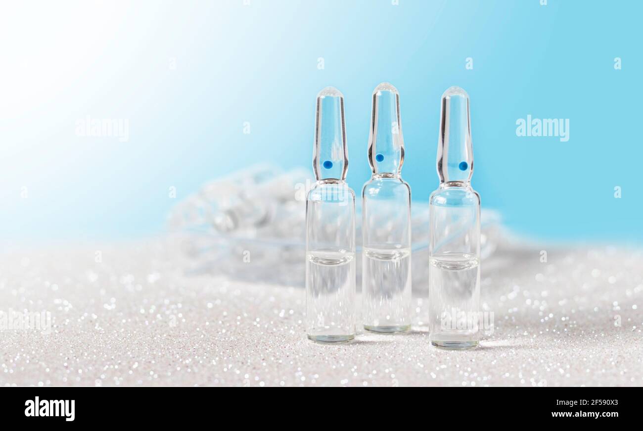 Medical ampoules for injection on a white background. Glass ampoules
