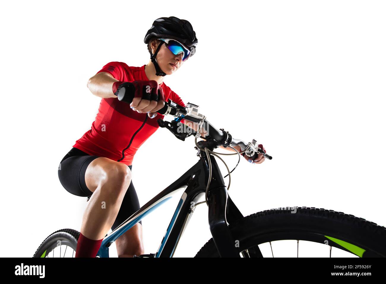 Professional female bike rider with road bike isolated over white ...