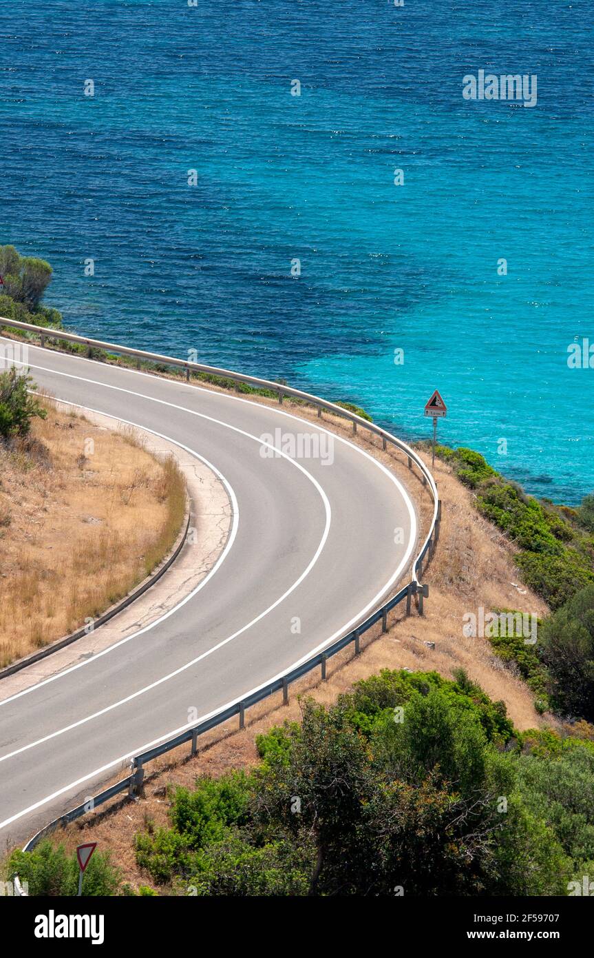 scenic and coastal road, with curves and trees Stock Photo