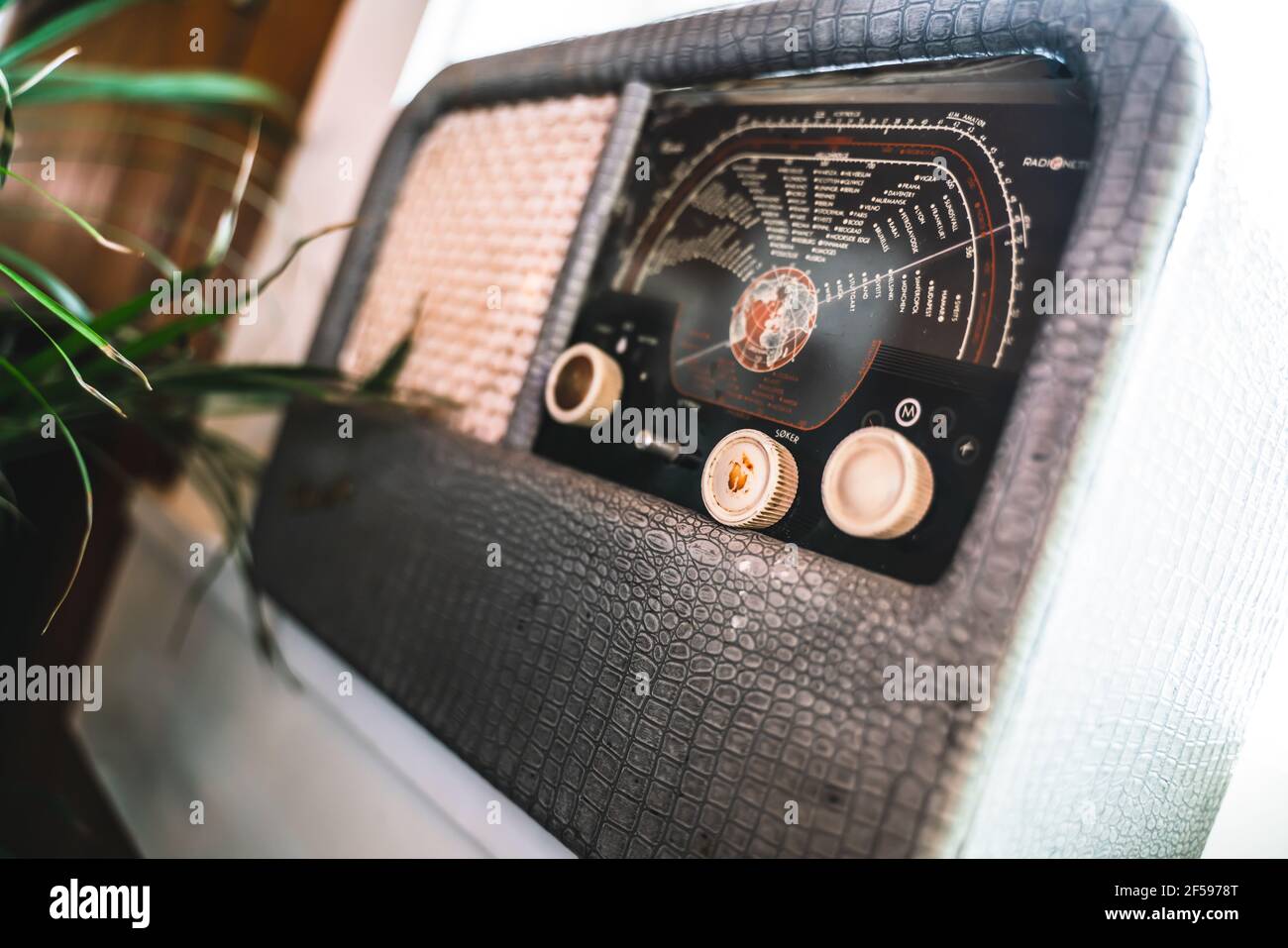 Classical old retro FM and AM radio receiver with shallow depth of field. Stock Photo