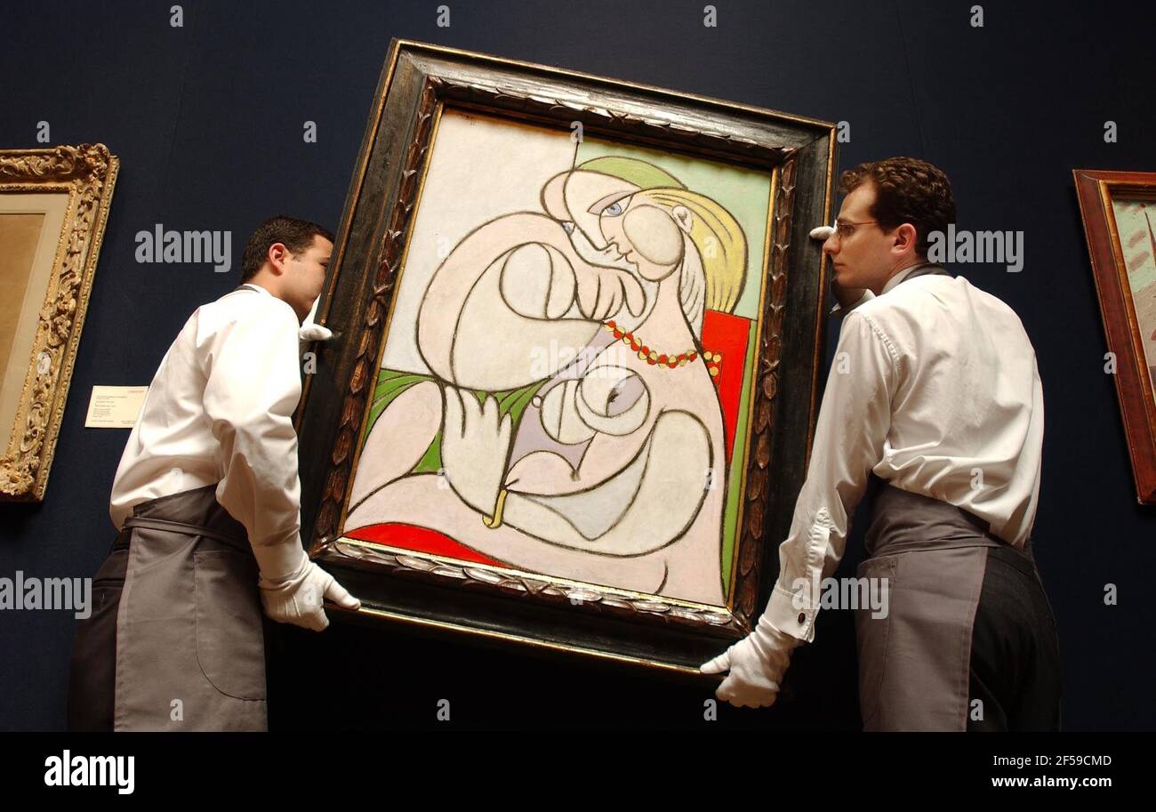 'Nu au collier', one of nine Picasso's being hung at Christies this morning as part of their 'Impressionist and Modern art' sale taking place on 25th June. Leading the sale, Picasso's work is expected to fetch  15-20 Million.21 June 2002 photo Andy Paradise Stock Photo