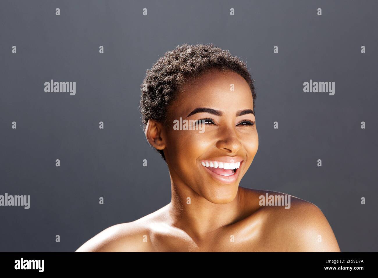 Close up beauty portrait of black female model smiling Stock Photo - Alamy