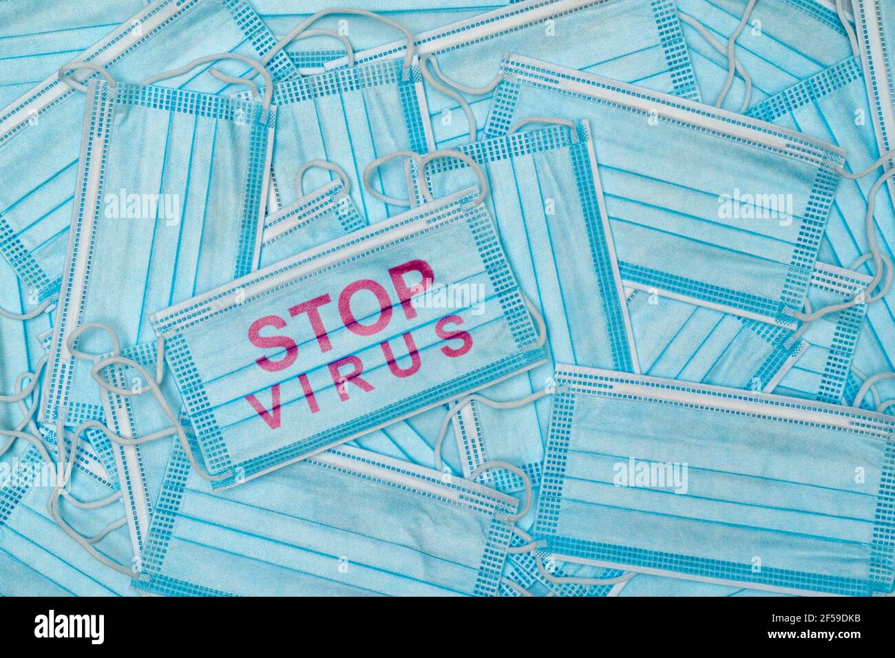 A face mask with the written word STOP VIRUS for the global Coronavirus ...