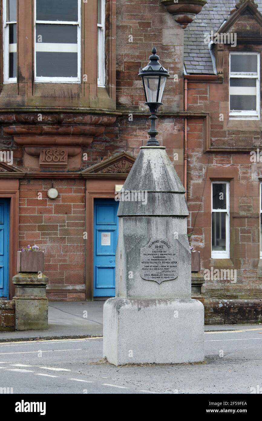 Sanquhar, Dumfries & Galloway, Scotland, UK. 22 Mar 2021. Town hall and Queen Victoria Diamond Jubilee Fountain Stock Photo