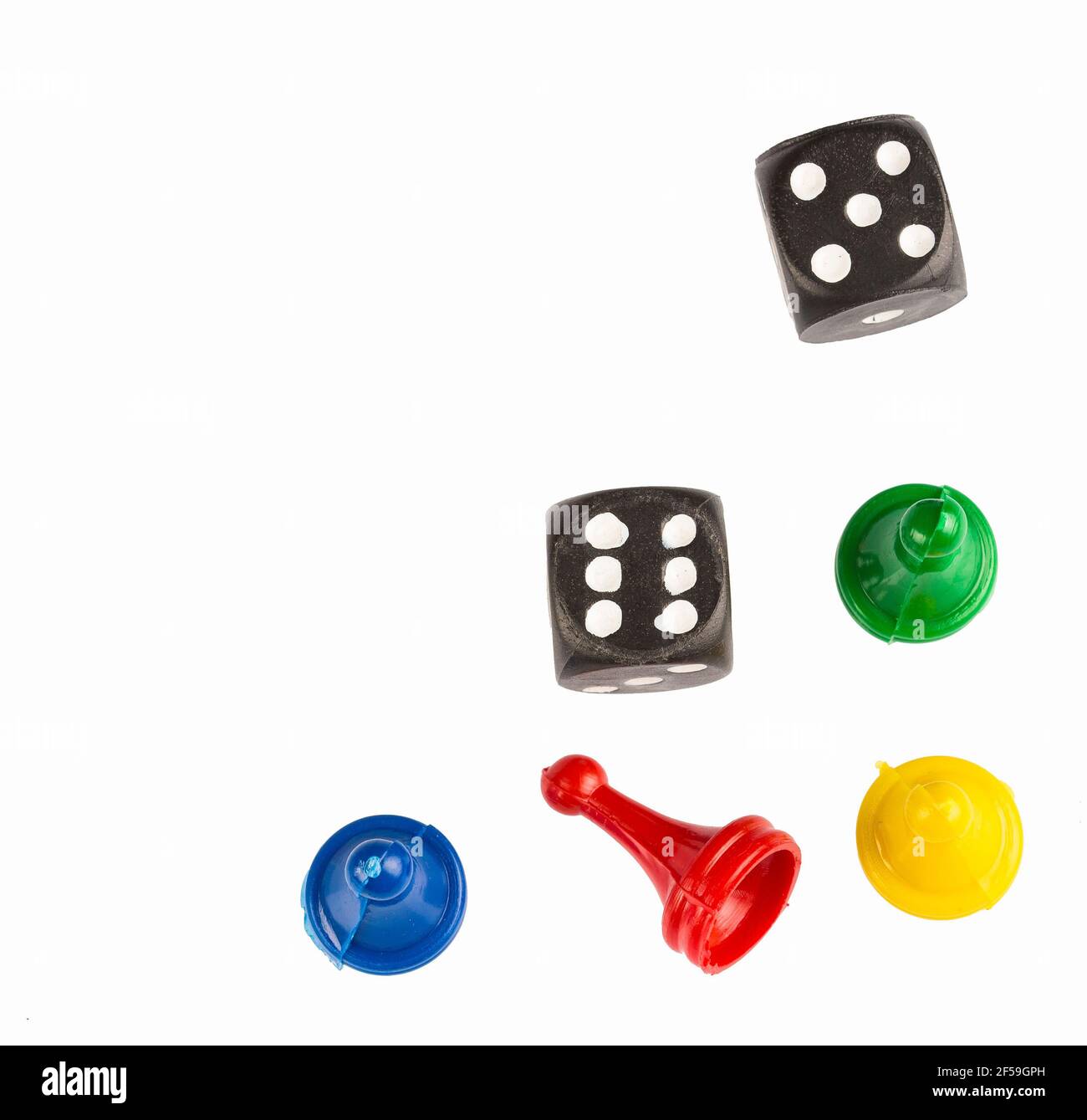 Colorful game pieces and dice Stock Photo Alamy