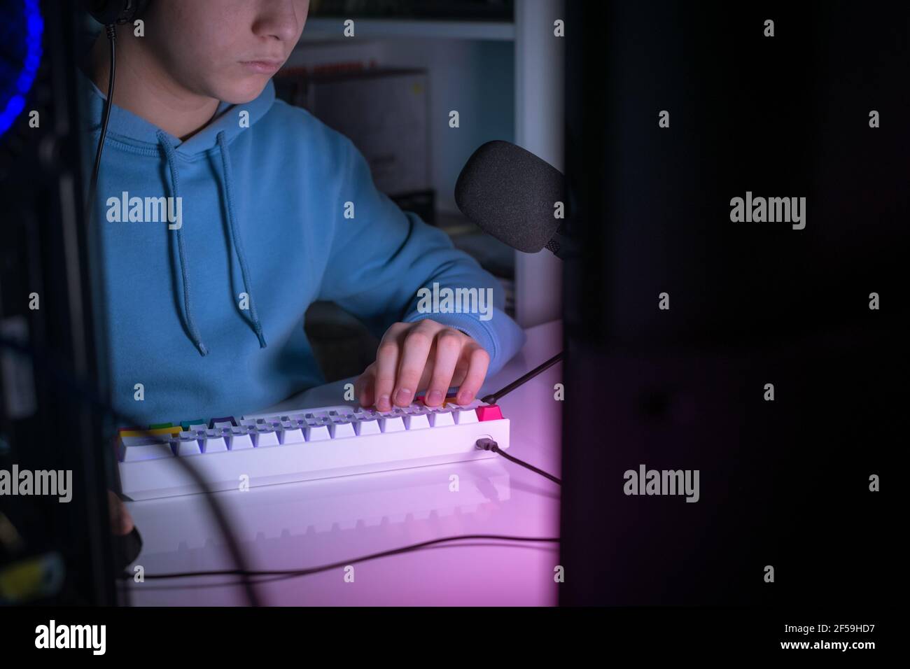 Video game streamers playing on their home console. Teenager playing