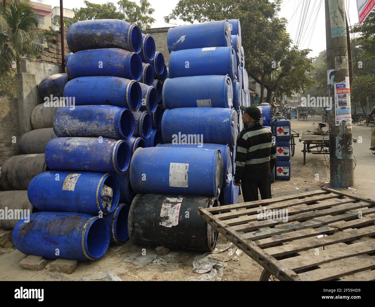 Dangerous chemicals products stored on a street of Hazaribagh, Dhaka, Bangladesh, used to produce leather Stock Photo