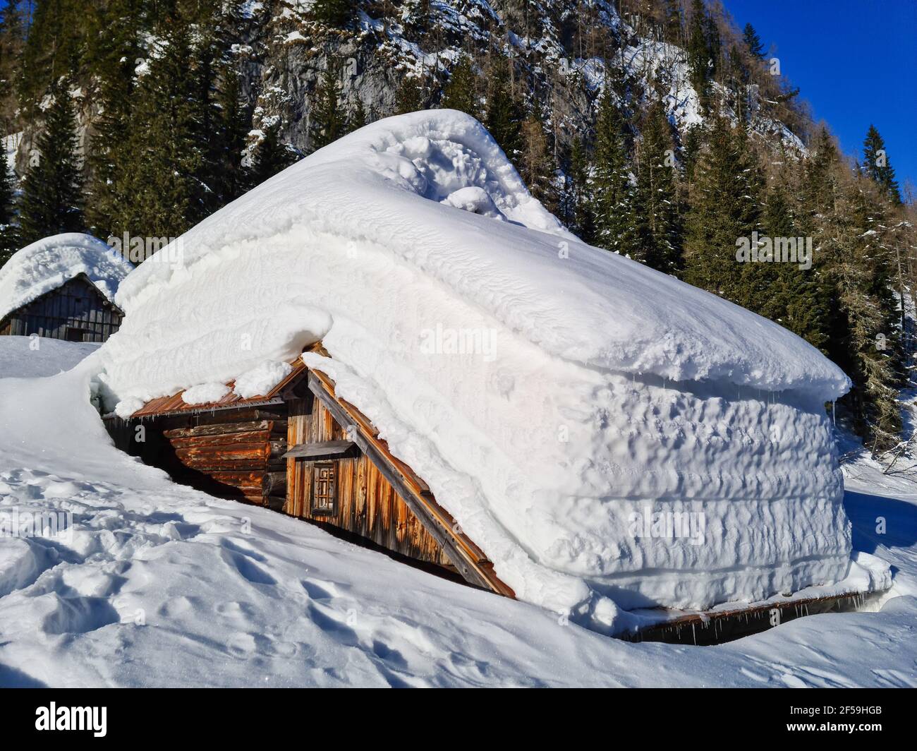 Mountain hut covered in snow Stock Photo - Alamy