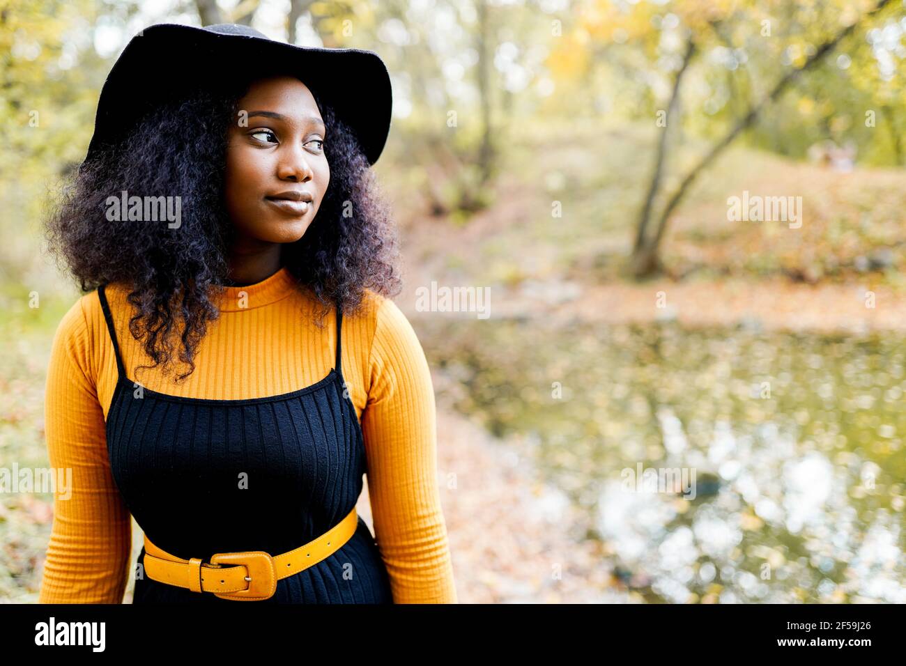 Close up portrait of a beautiful young african american woman in black ...
