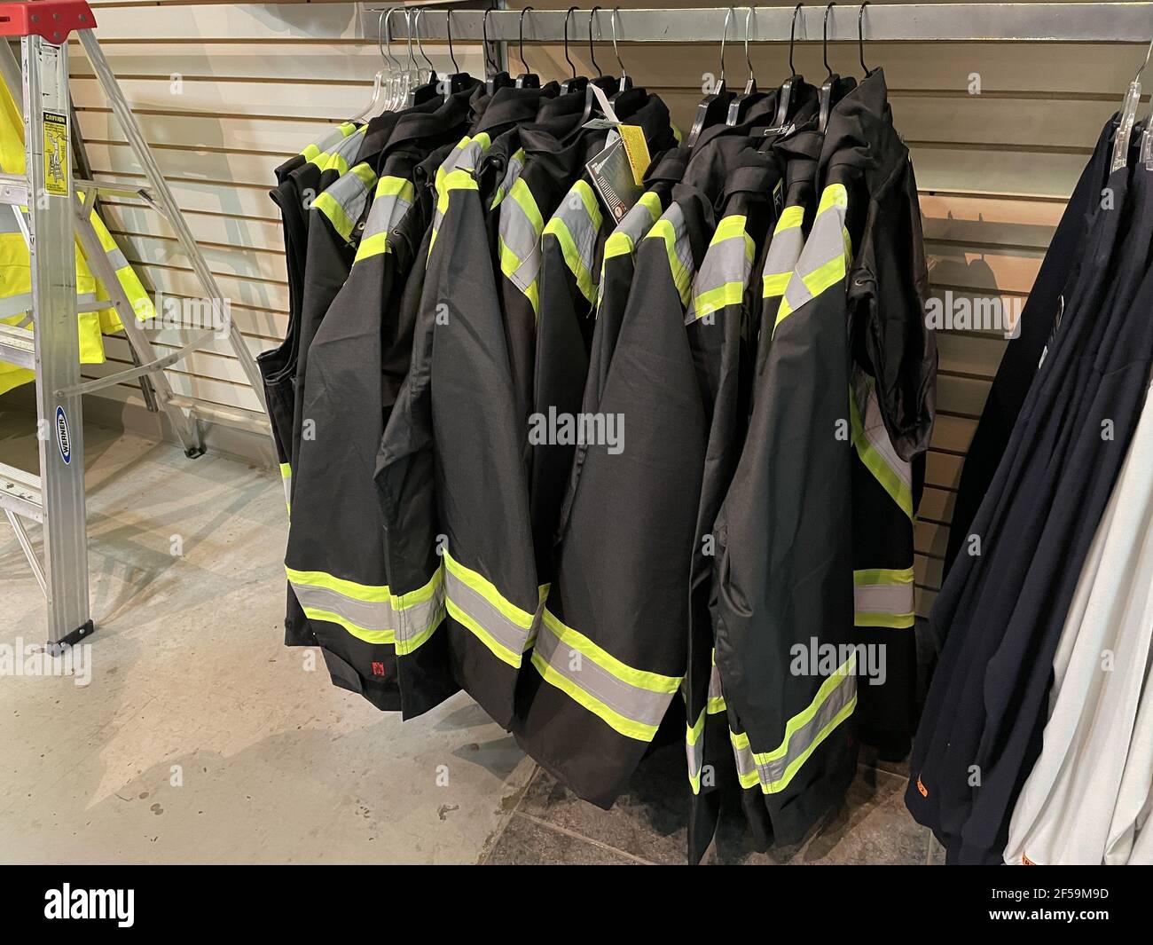 black jacket with yellow stripes