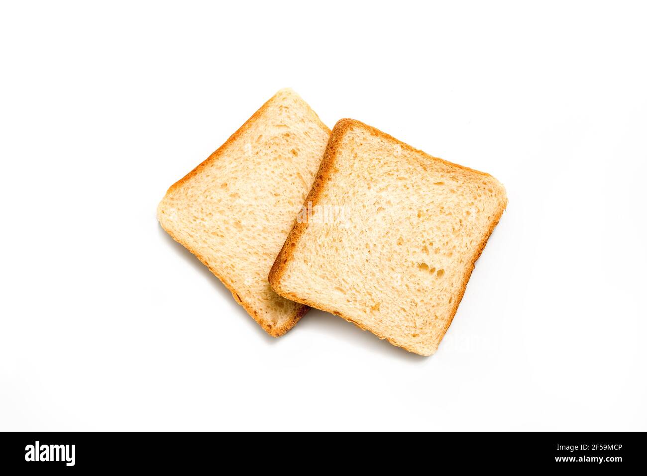 Two Slices of white bread toast isolated on white Top View Stock