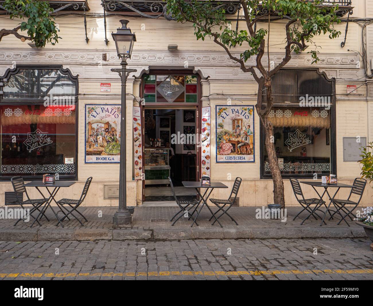 A pavement bar and cafe in Calle Mateos Gago Seville Spain Stock Photo
