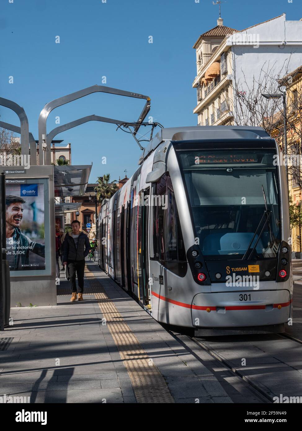A CAF Urbos 3 tram operating on the Metro Centro public transport tramway system in Seville Spain. Stock Photo