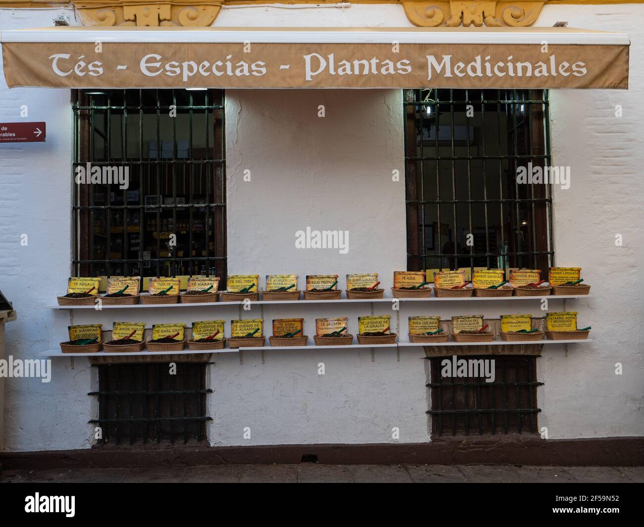 A shop frontage with a display of herbal teas and medicinal products Seville Spain Stock Photo