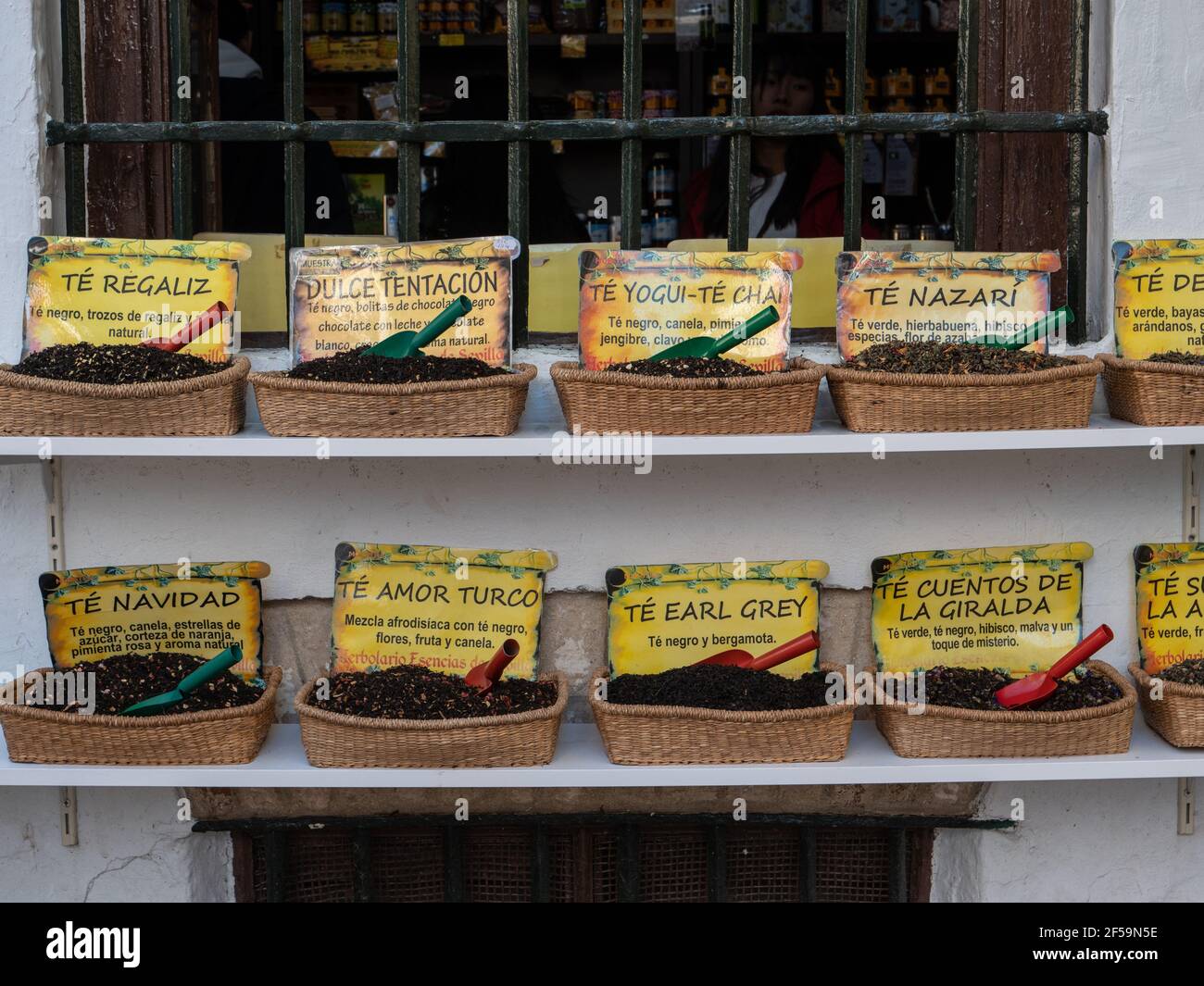 A shop frontage with a display of herbal teas and medicinal products Seville Spain Stock Photo