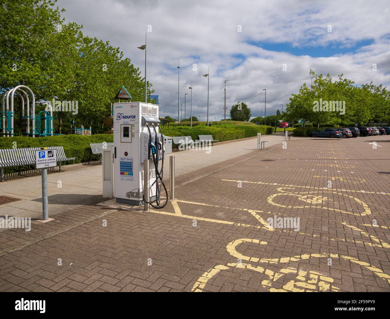 Electric vehicle charger shopping mall hires stock photography and