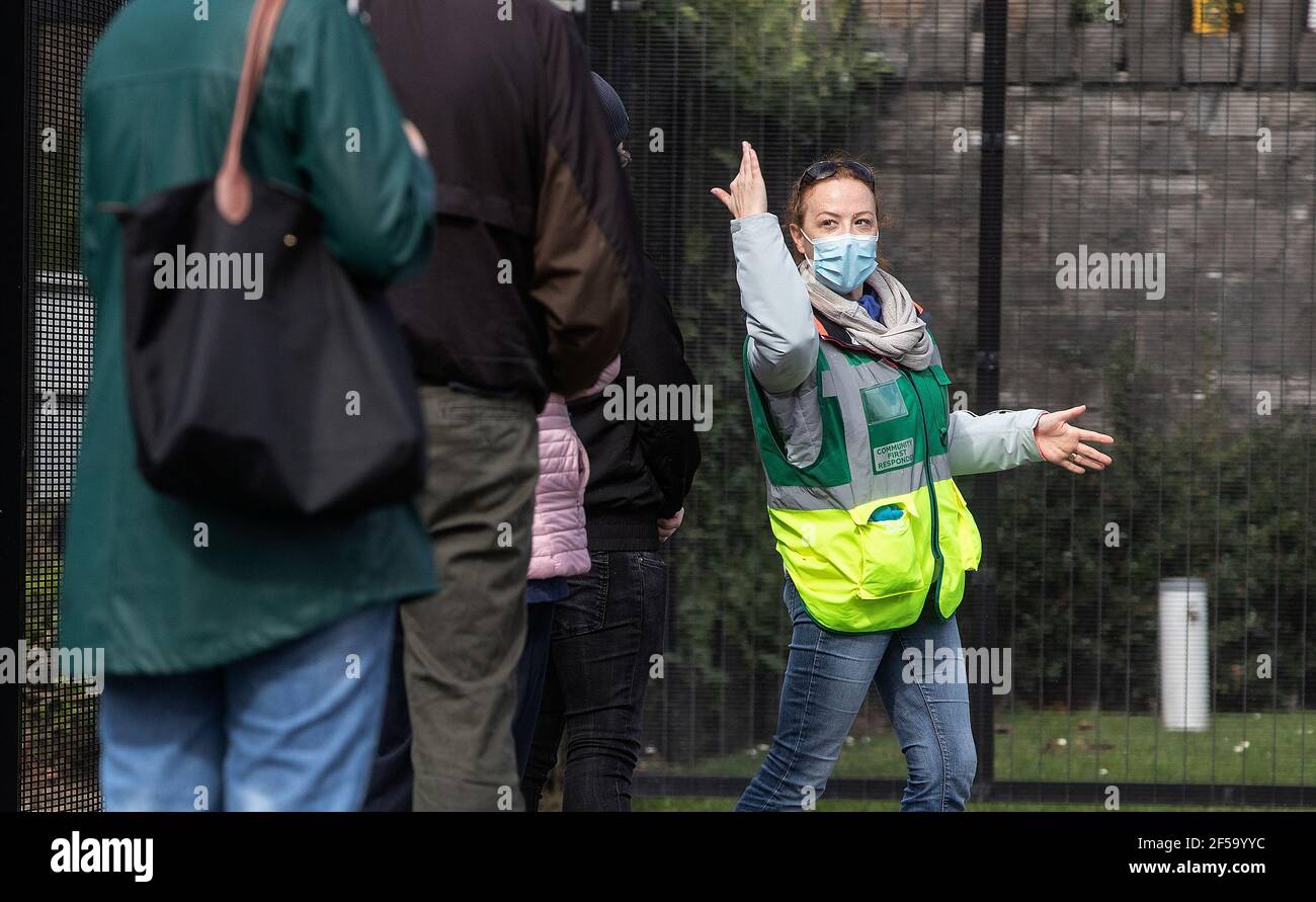 Members of the public queue at a walk-in test centre on the grounds of Grangegorman Primary Care Centre in Dublin as a number of centres have opened in areas where there is a high rate of Covid-19 transmission. The public does not need to get a GP referral and all tests will be free under the new initiative. Picture date: Thursday March 25, 2021. Stock Photo