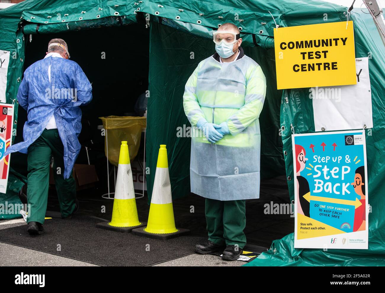 Members of the National Ambulance Service working at a walk-in test centre on the grounds of Grangegorman Primary Care Centre in Dublin as a number of centres have opened in areas where there is a high rate of Covid-19 transmission. The public does not need to get a GP referral and all tests will be free under the new initiative. Picture date: Thursday March 25, 2021. Stock Photo