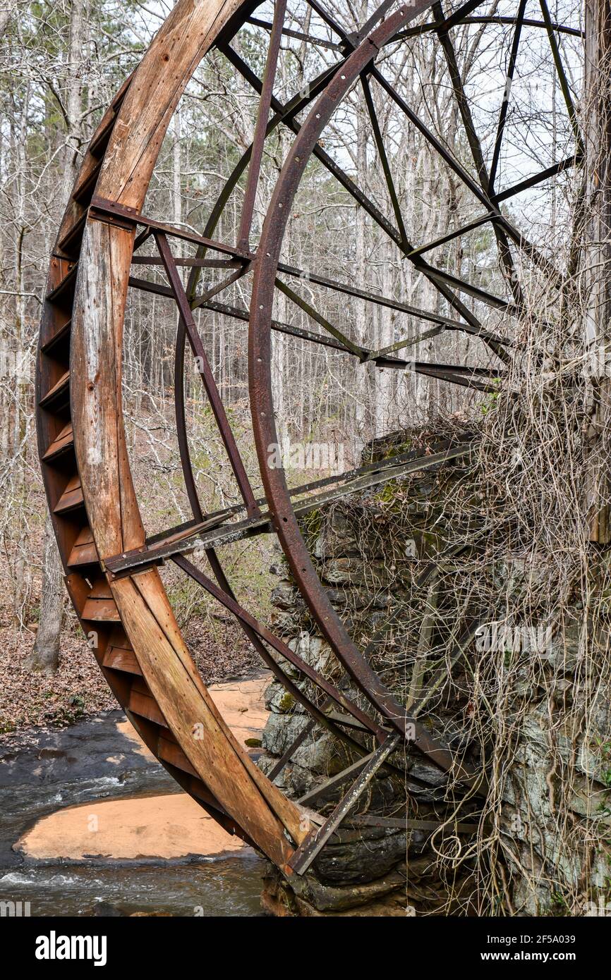 Old historic lumber mill wheel along the river Stock Photo Alamy
