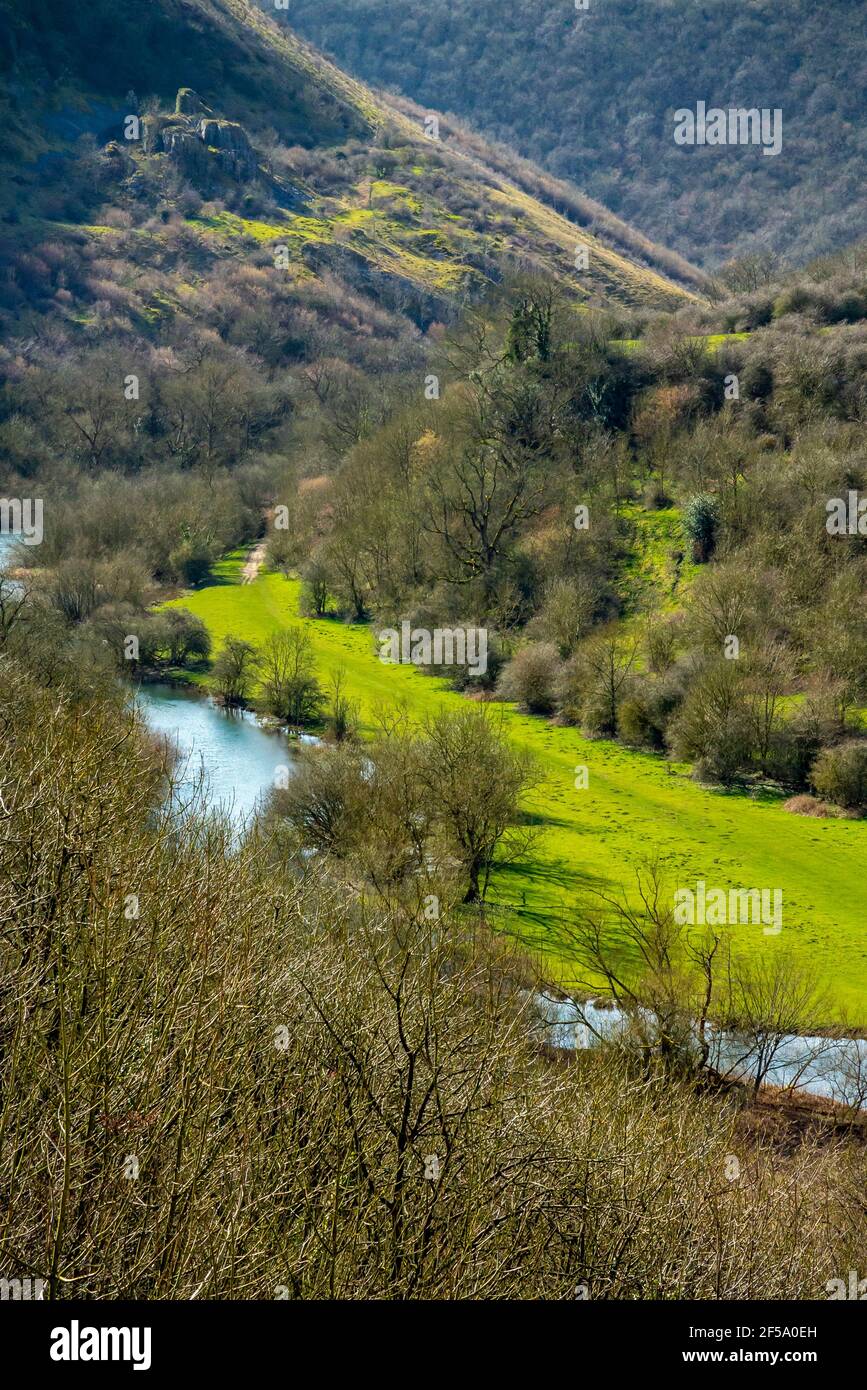 The River Wye and Monsal Dale in early spring sunshine from Monsal Head a popular viewpoint in the Peak District National Park Derbyshire England UK. Stock Photo