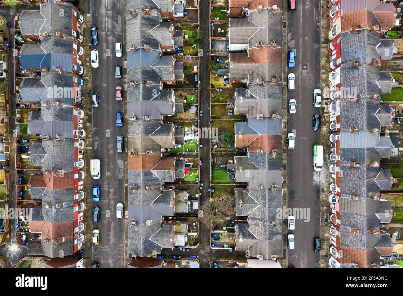 An aerial view of rows of terraced houses and streets in the North of ...