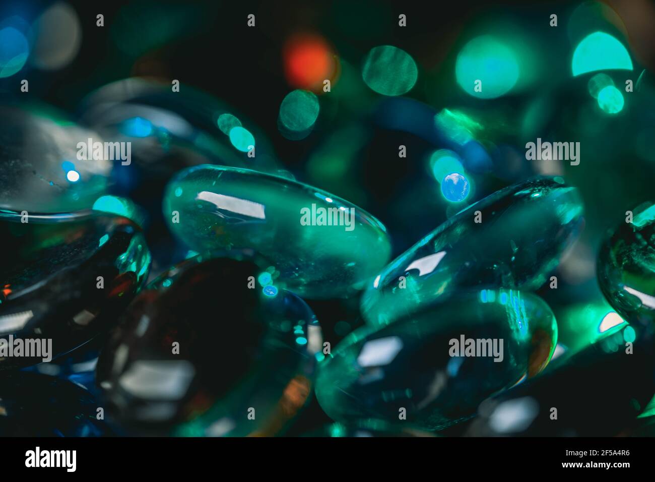 Background formed by a wall made of colored glass stones Stock Photo ...