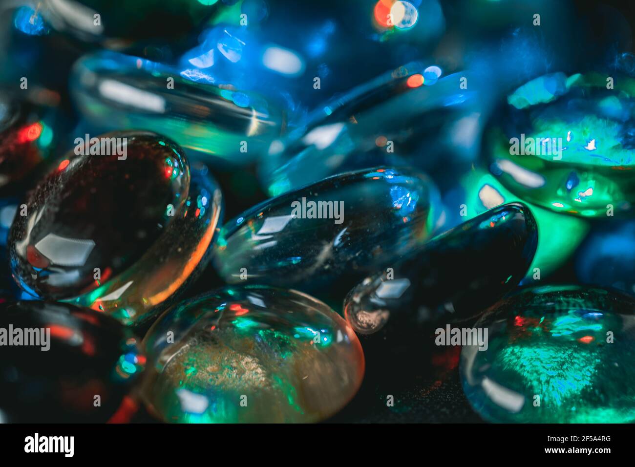 Background formed by a wall made of colored glass stones Stock Photo ...