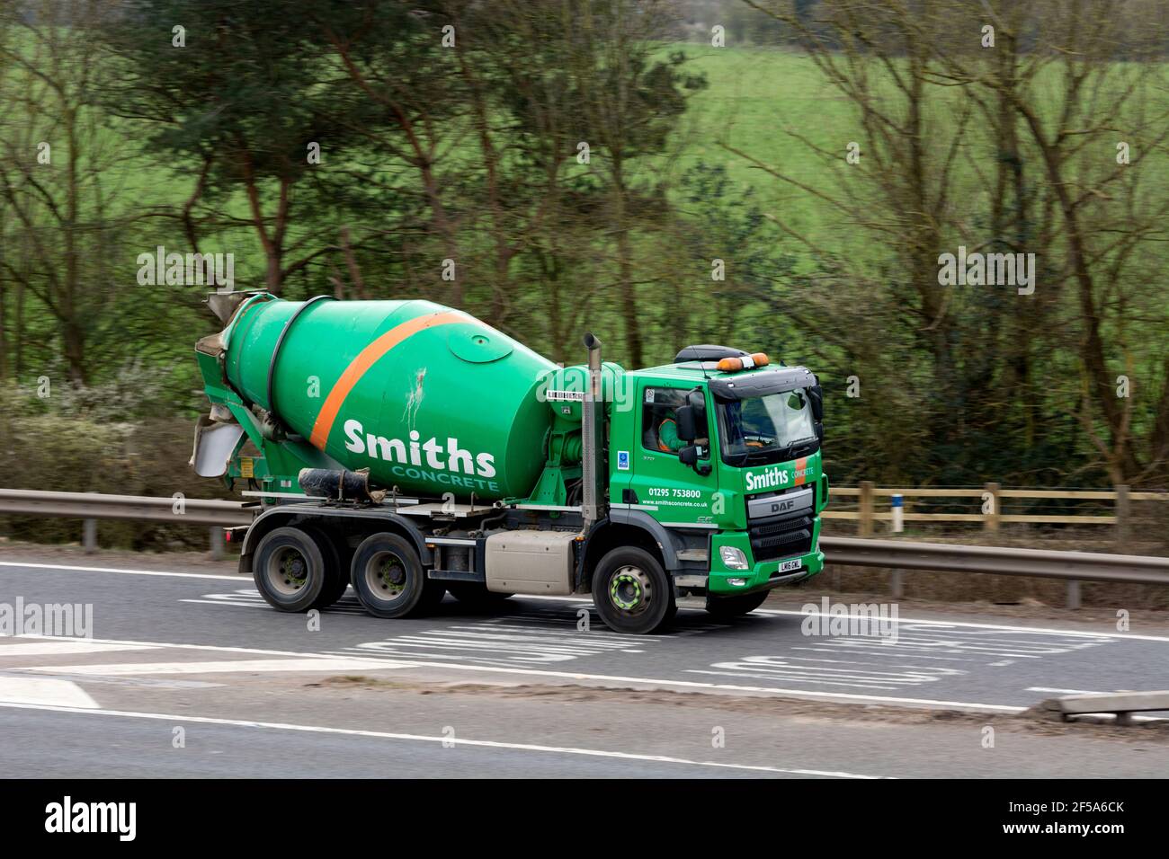 A concrete mixer lorry leaving the M40 motorway, Warwick, UK Stock