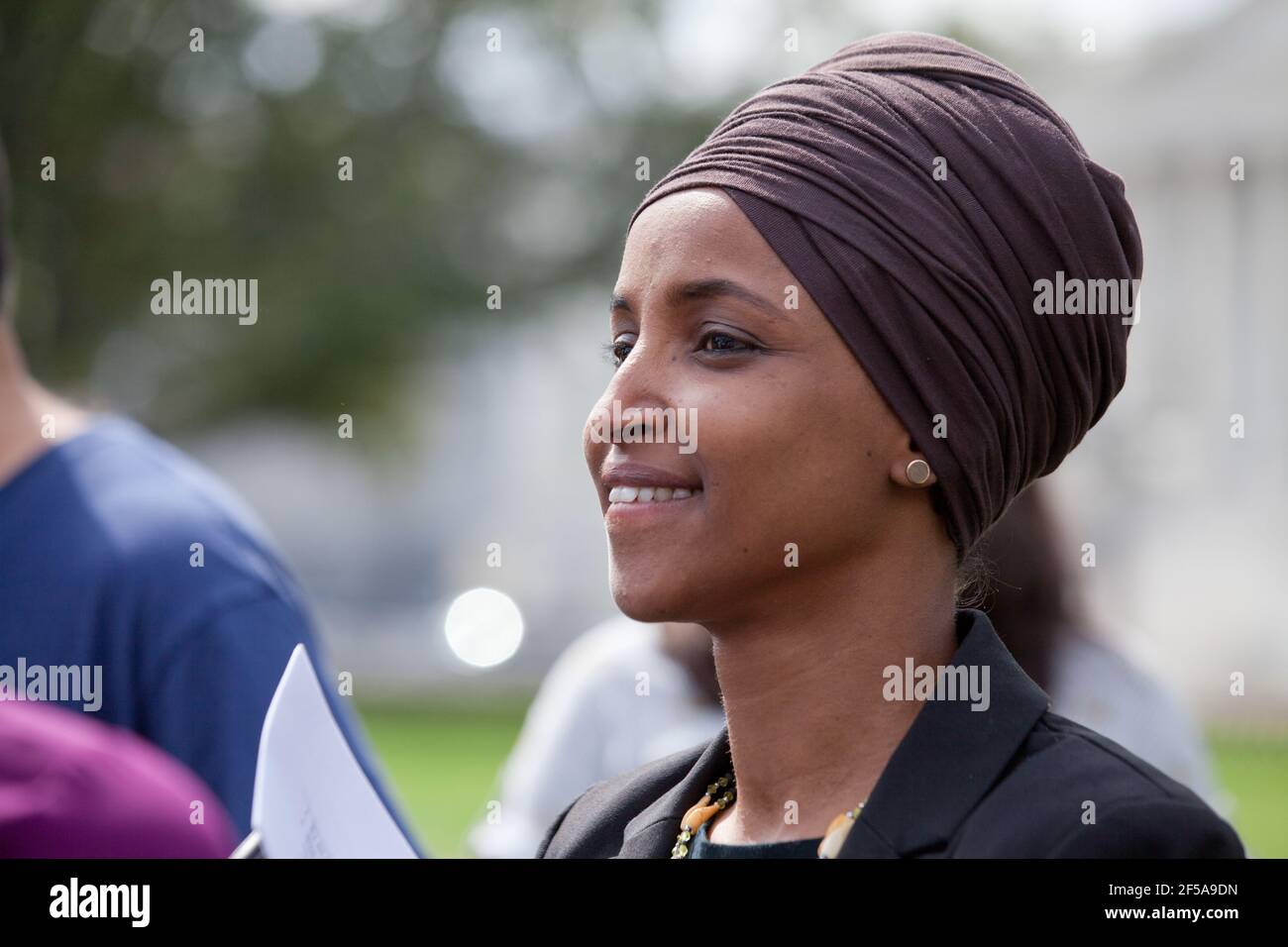 Sept. 26th, 2019, Washington, DC:  US Congresswoman Ilhan Omar (D-MN), Congresswoman Barbara Lee (D-CA), and Congressman Al Green (D-TX), speak at an 'Impeach Trump' rally, hosted by Progressive Democrats of America, in front of the US Capitol. Pictured: Rep. Ilhan Omar (D-MN) smiling. Stock Photo