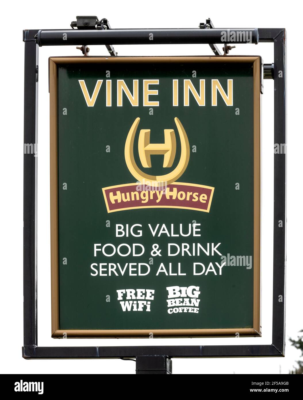 Traditional hanging pub sign at The Vine Inn - a Hungry Horse public house - Ower, Romsey, Hampshire, England, UK Stock Photo
