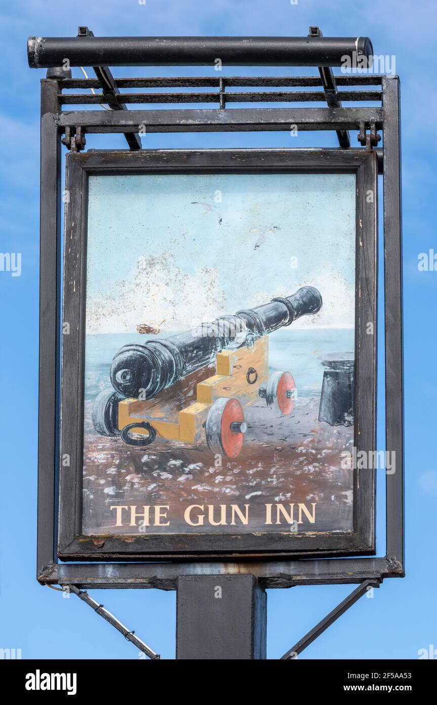 Traditional hanging pub sign at The Gun Inn - public house - Keyhaven Road, Keyhaven, Milford-on-Sea, Lymington, Hampshire, England, UK Stock Photo