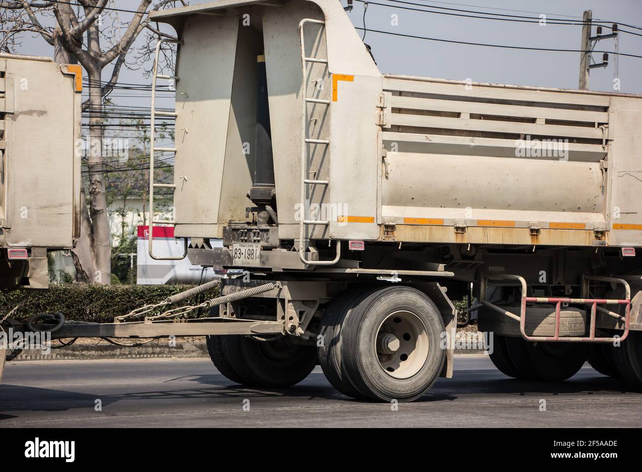 Chiangmai, Thailand - March  2 2021:  Private Mitsubishi Fuso Dump Truck.  Photo at road no.121 about 8 km from downtown Chiangmai, thailand. Stock Photo