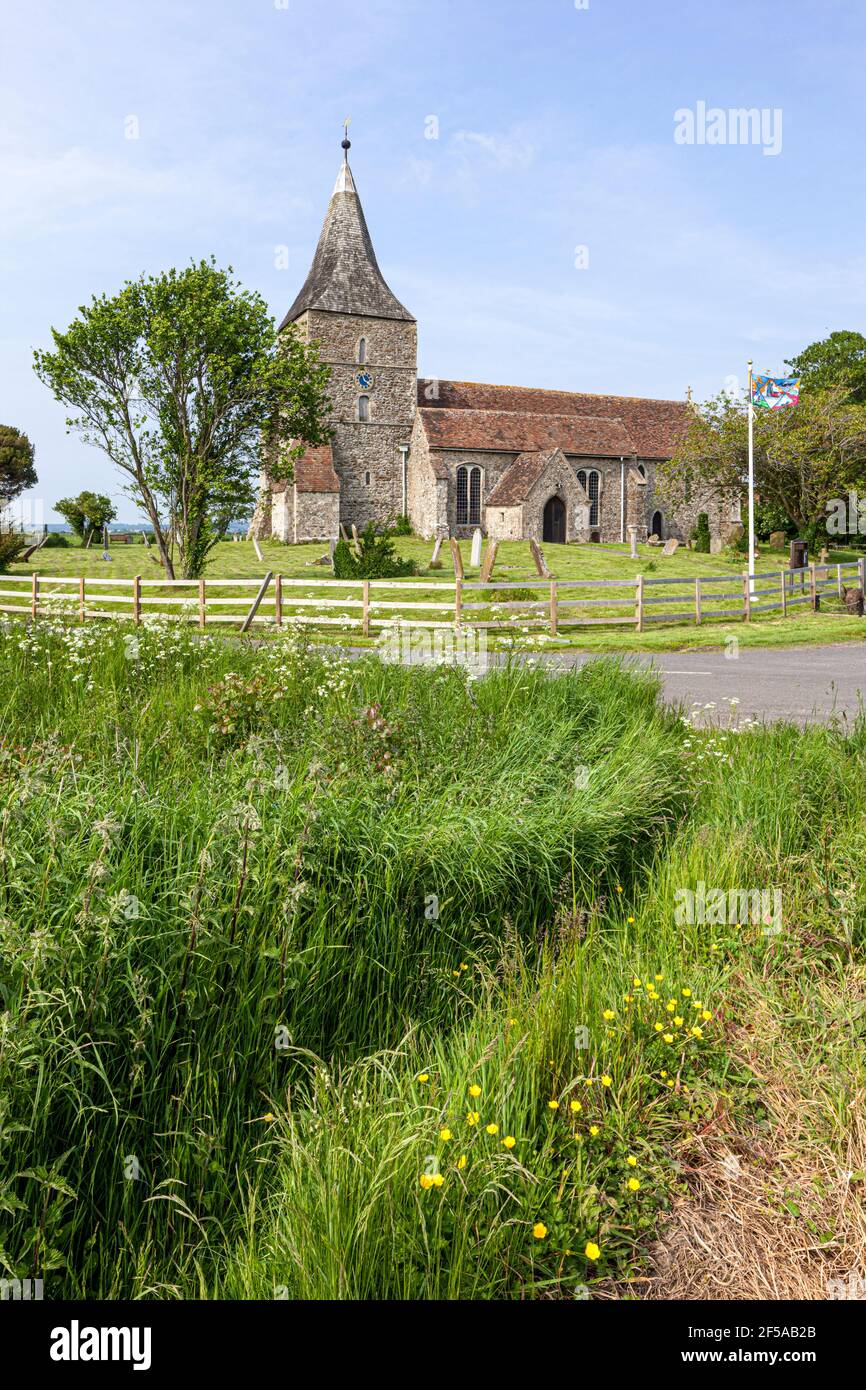 The church of St Mary the Virgin in the Romney Marsh village of St Mary in the Marsh, Kent UK Stock Photo