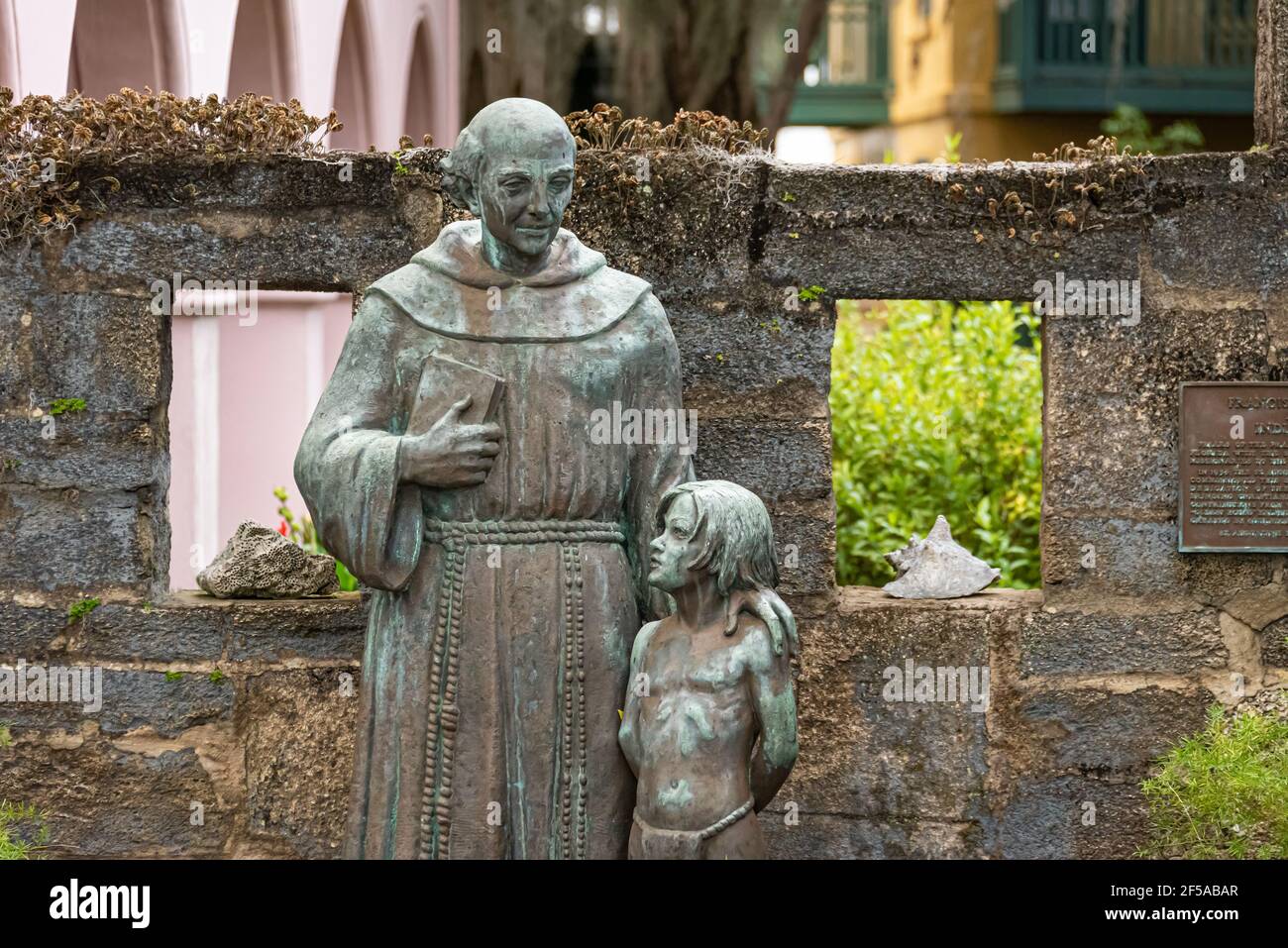 Franciscan with Indian Boy statue at the Gonzalez-Alverez House (The Oldest House), an historic landmark in Old City St. Augustine, Florida. (USA) Stock Photo