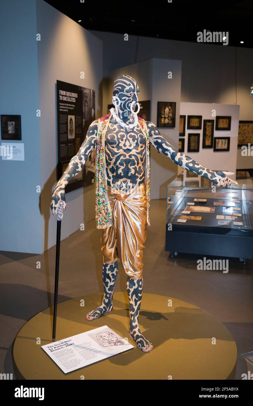 Mannequin figure sculpture recreation of The Great Omi, a historical person whose body was covered in tattoos, a sculpture by Anthony Bennett. Part of the exhibition 'British Tattoo Art Revealed' on display at No.1 Smithery gallery in The Historic Dockyard Chatham. Kent, UK. (121) Stock Photo