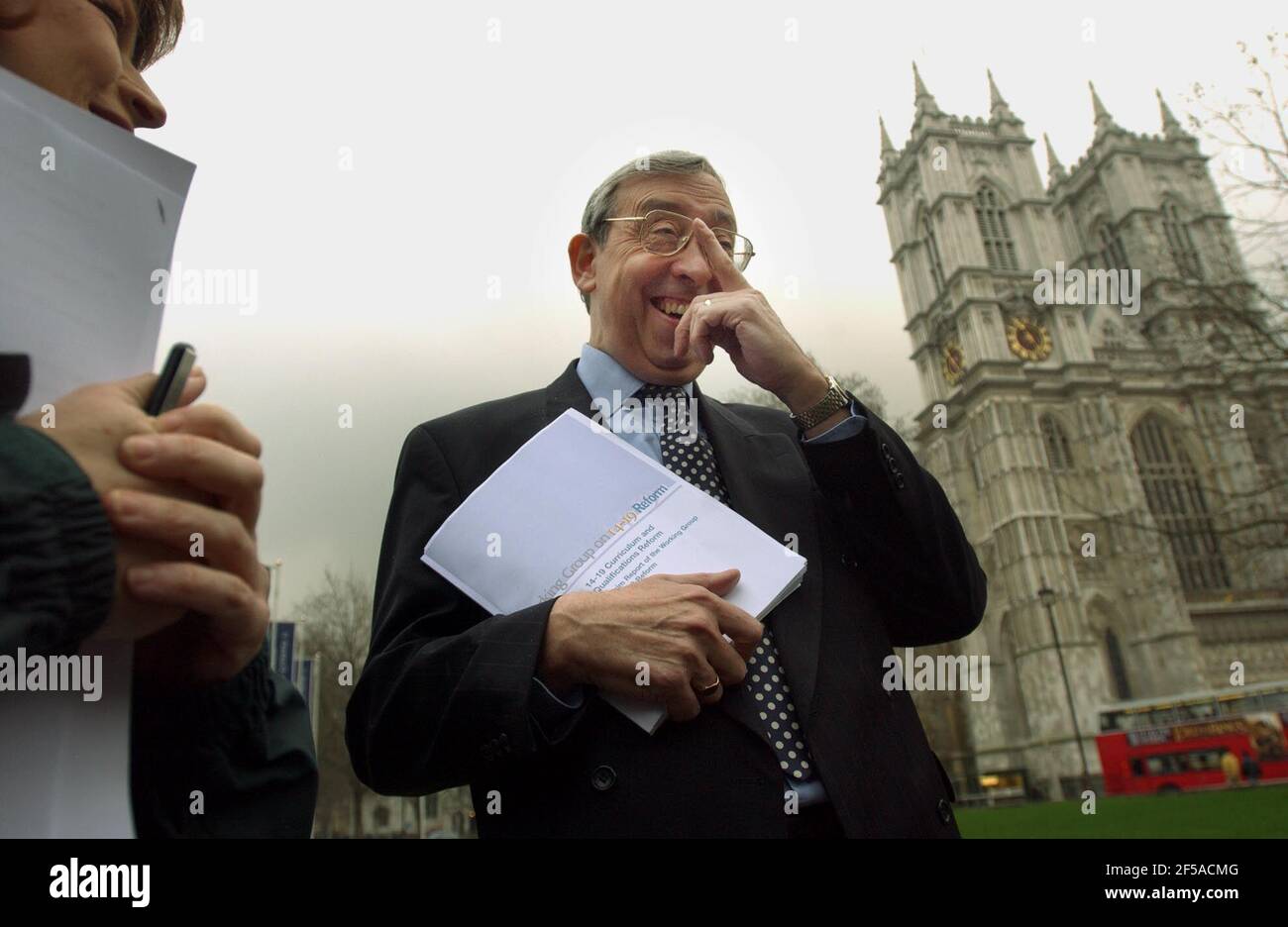MIKE TOMLINSON,CHAIRMAN OF THE WORKING GROUP 14-19 REFORM.OUTSIDE THE QE2,WITH HIS REPORT.17/2/04 PILSTON Stock Photo