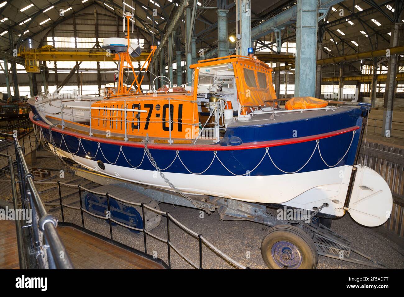Old vintage historic RNLB Lifeboat 'J.G. Graves of Sheffield' on display at Number Four Boat House / Boathouse Number 4 at Historic Dockyard / Dockyards Chatham in Kent. UK (121) Stock Photo