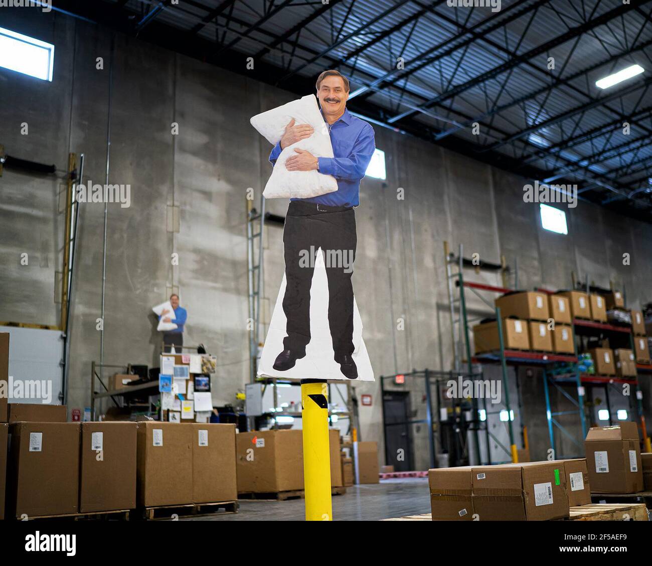 Cardboard cut outs of Mike Lindell are seen throughout the MyPillow