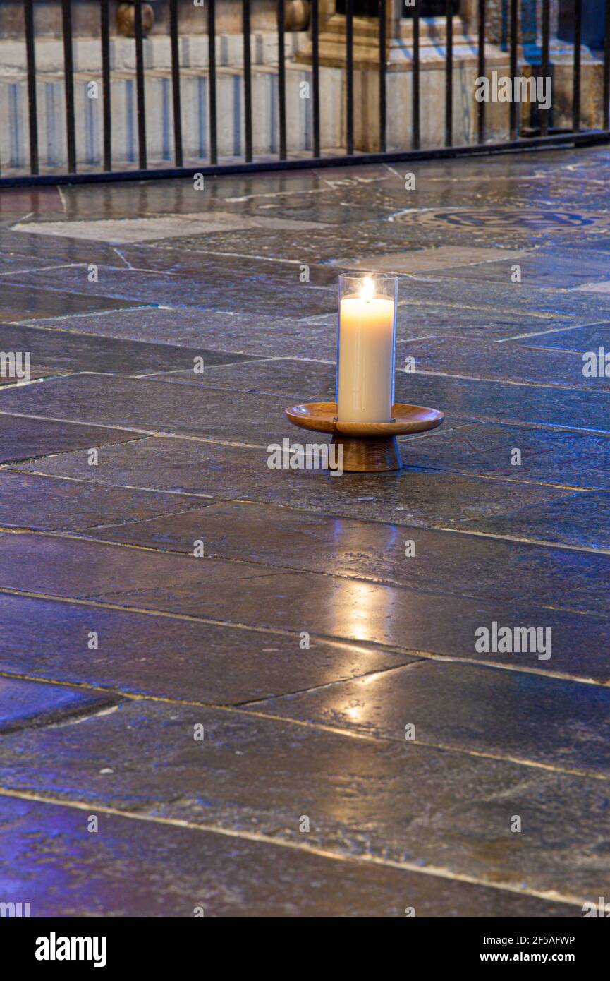 A candle burning on the site of the shrine of St Thomas Becket in Canterbury Cathedral, Kent UK Stock Photo