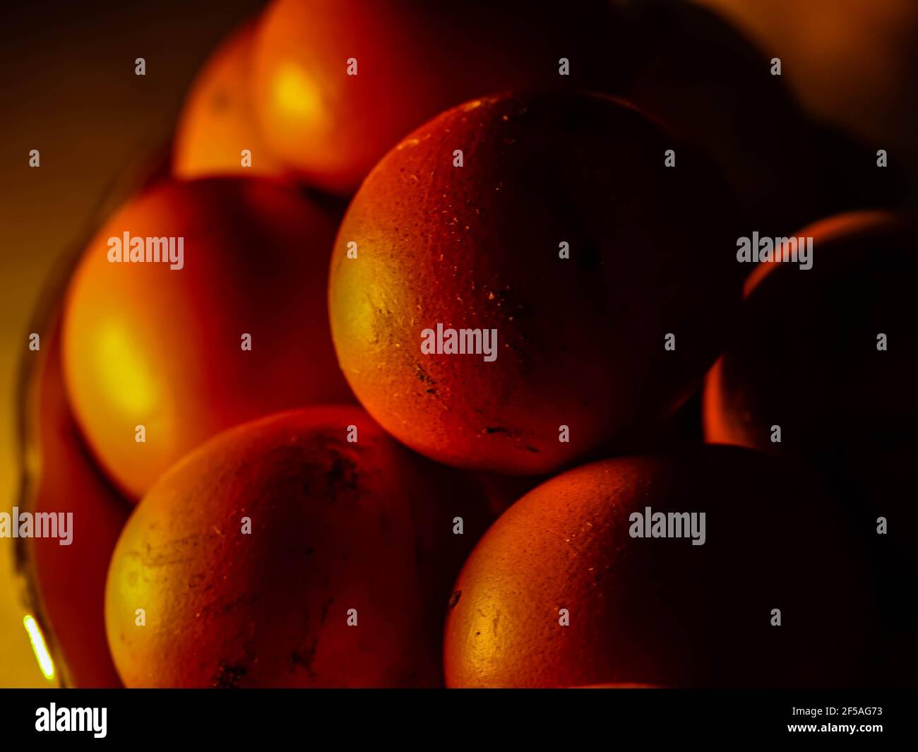 The chicken eggs in the panel are placed on a brown wooden background. Stock Photo