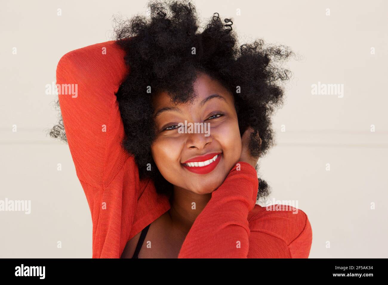 Portrait young woman playing hair hi-res stock photography and images ...