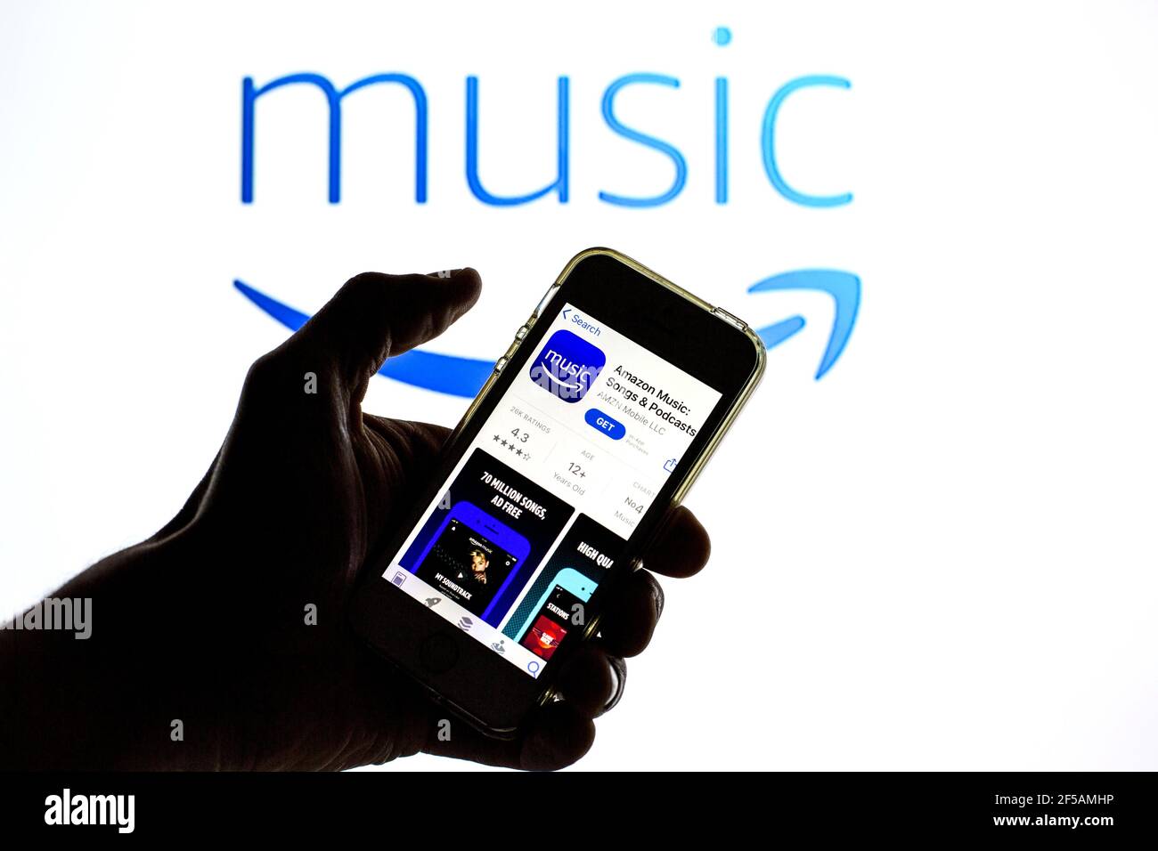 In This Photo Illustration The Amazon Music App In App Store Seen Displayed On A Smartphone Screen And A Amazon Music Logo In The Background Stock Photo Alamy In This Photo Illustration The Amazon Music App In App Store Seen Displayed On A Smartphone Screen And A Amazon Music Logo In The Background Stock Photo Alamy