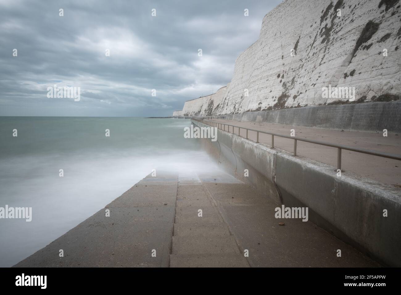 White chalk cliffs, Undercliff Walk and Hills of  South Downs National Park, Saltdean, East Sussex, United Kingdom Stock Photo