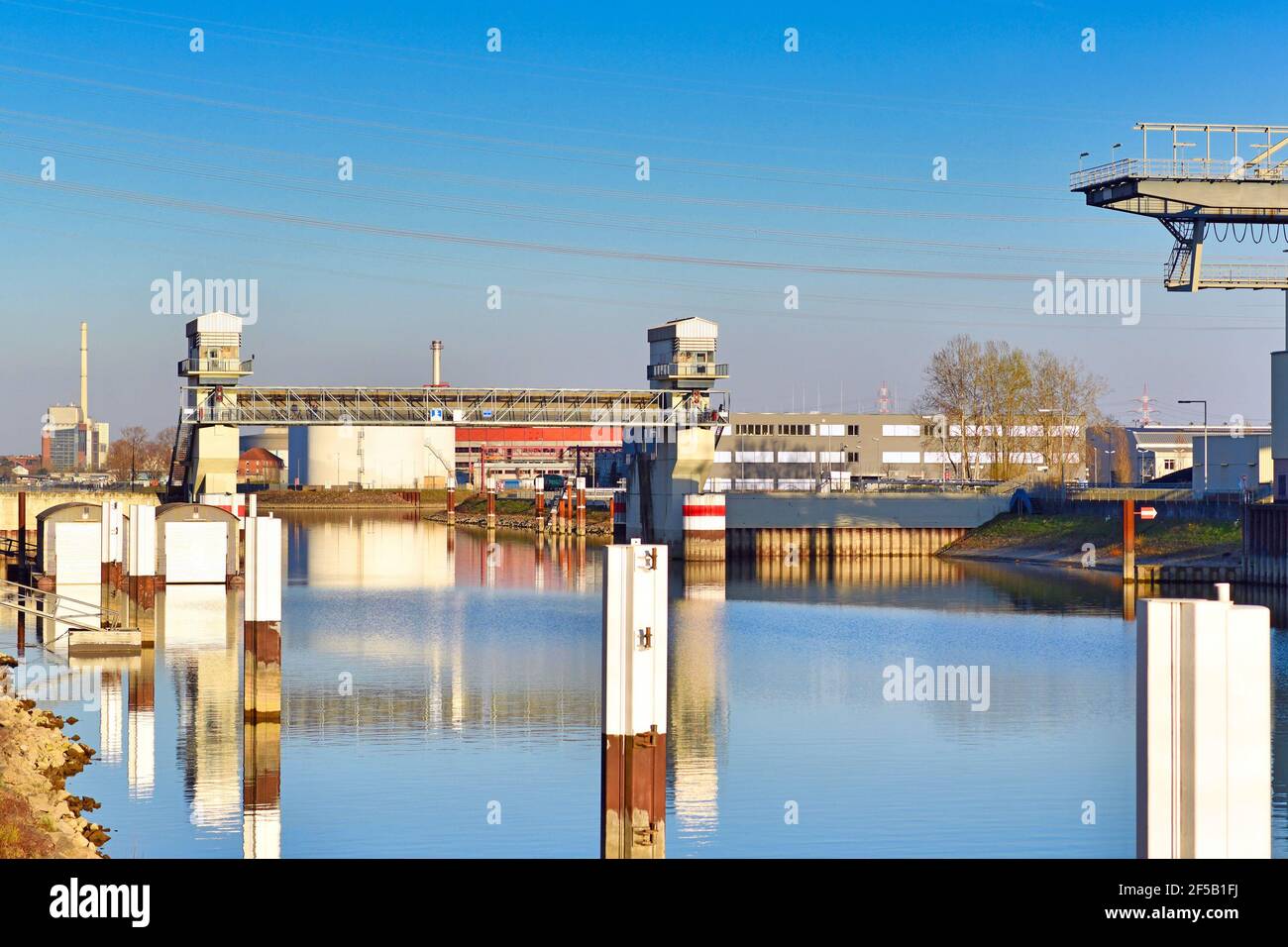 Karlsruhe, Germany - March 2020: Harbor flood barrage entrance gate called 'Hafensperrtort' at rhine river port Stock Photo