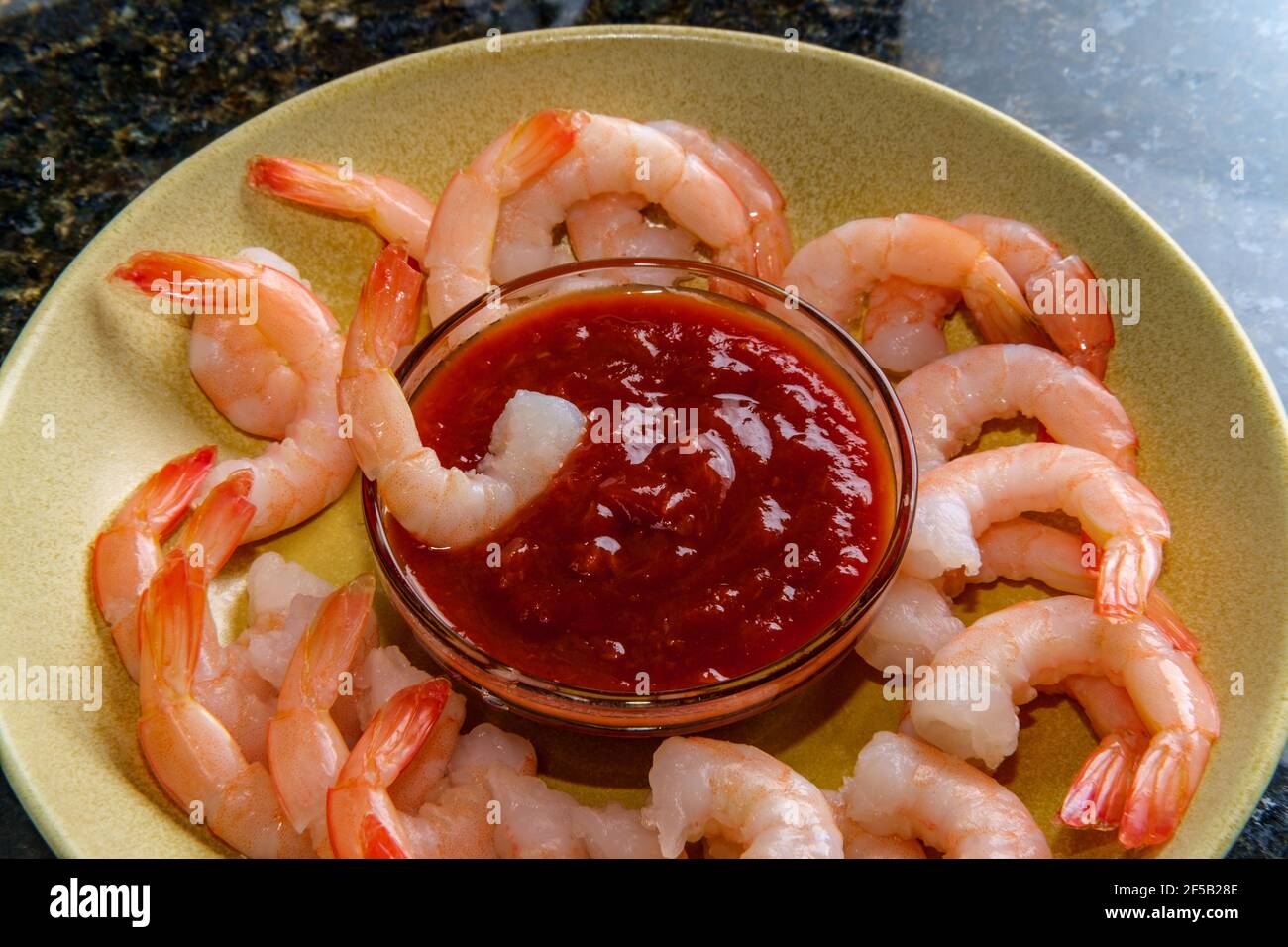 Delightful tailon shrimp cocktail served with horseradish dipping