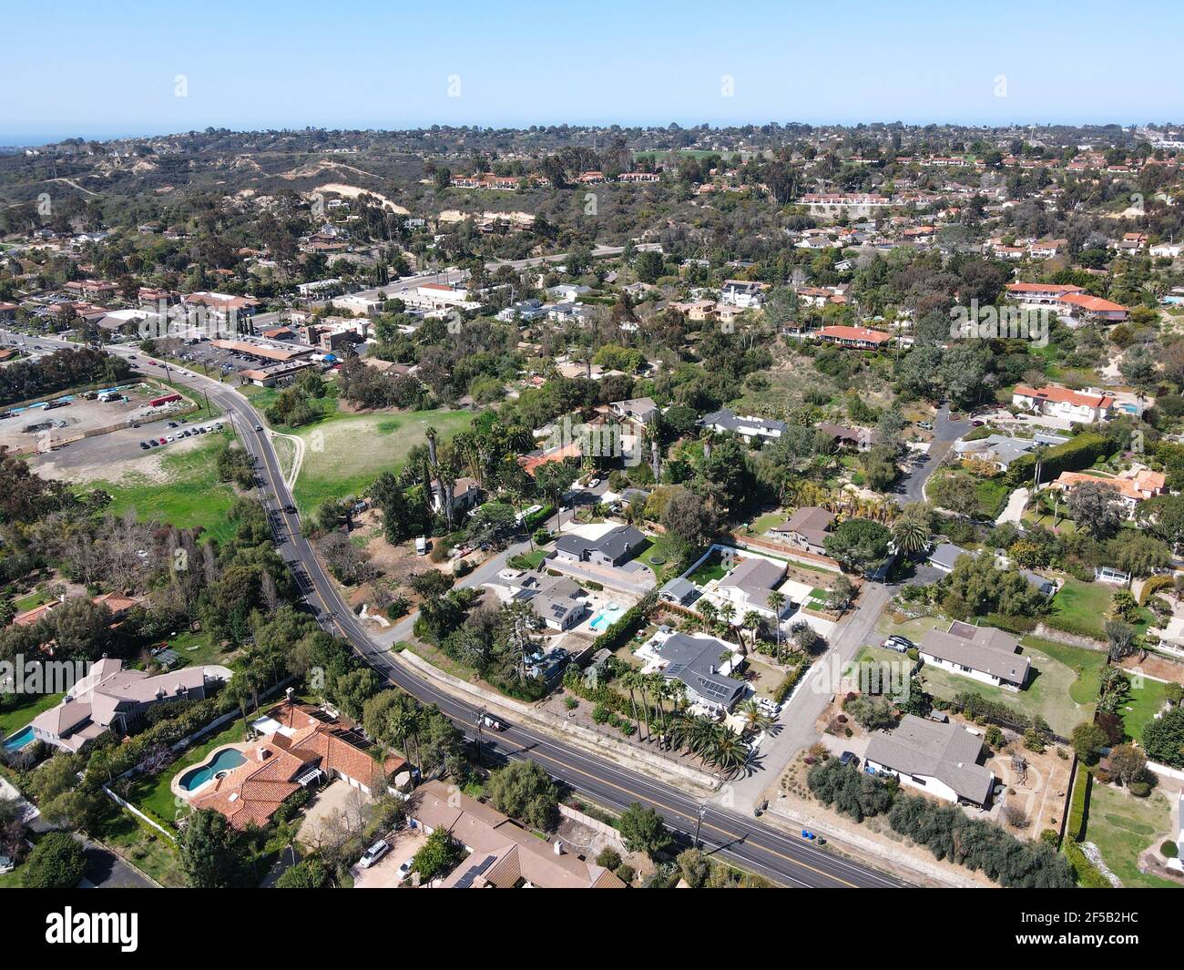 Aerial view of Rancho Santa Fe neighborhood with big mansions with pool ...