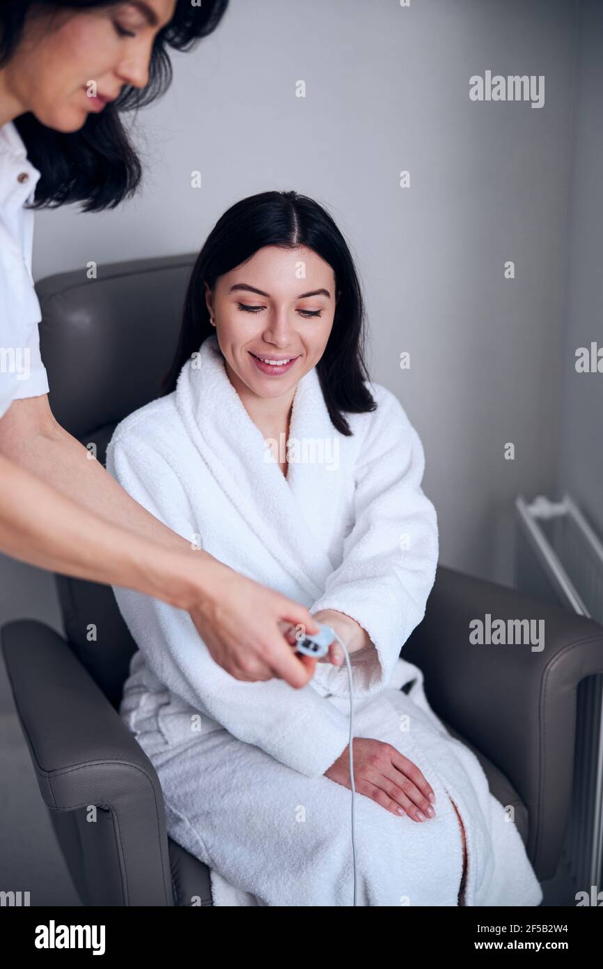 Oxygen saturation measuring instrument hires stock photography and