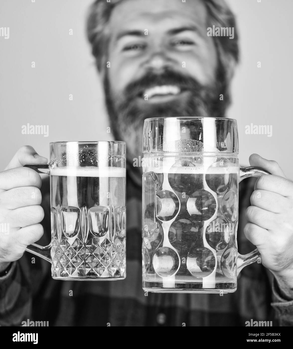 Get drunk. Alcoholic. Thirsty man drinking beer in pub bar. Hipster