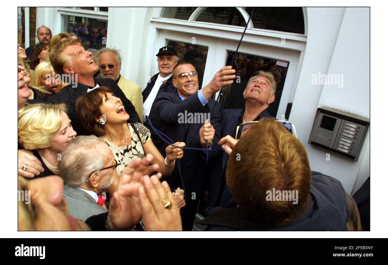 Film stars Jean Claude van Damme and Sir John Mills (bottom left) were on hand to unviel a Blue Plaque to honour John Lennon on the old Apple Records building in Baker street, London, where the Beatles famously played a rooftop gig.pic David Sandison 27/4/2003 Stock Photo