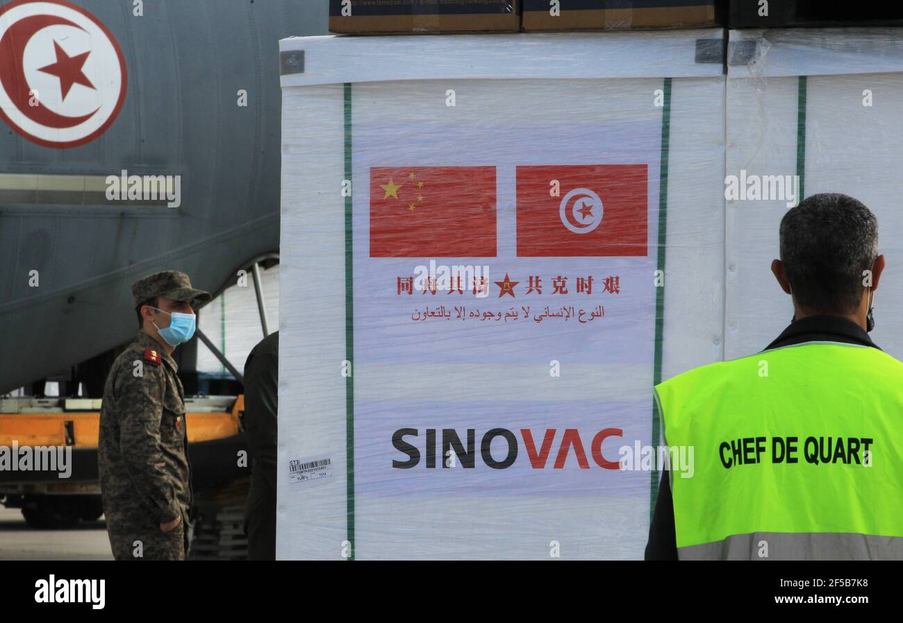 Container with the vaccines seen at Tunis Carthage International Airport during the ceremony.Tunis Carthage International Airport, under the supervision of the Minister of Health, Dr. Fawzi Mahdi, and the Chinese Ambassador to Tunisia, Mr. ZHANG Jianguo, and in the presence of the Emir of the Major General, Doctor General of Military Health, Mr. Mustafa Ferjani, a convoy received a new shipment of anti-Covid 19 vaccine containing 200 thousand doses of Sinovac vaccine provided by the People's Republic of China as a gift to the Republic of Tunisia, as part of the health cooperation between the t Stock Photo